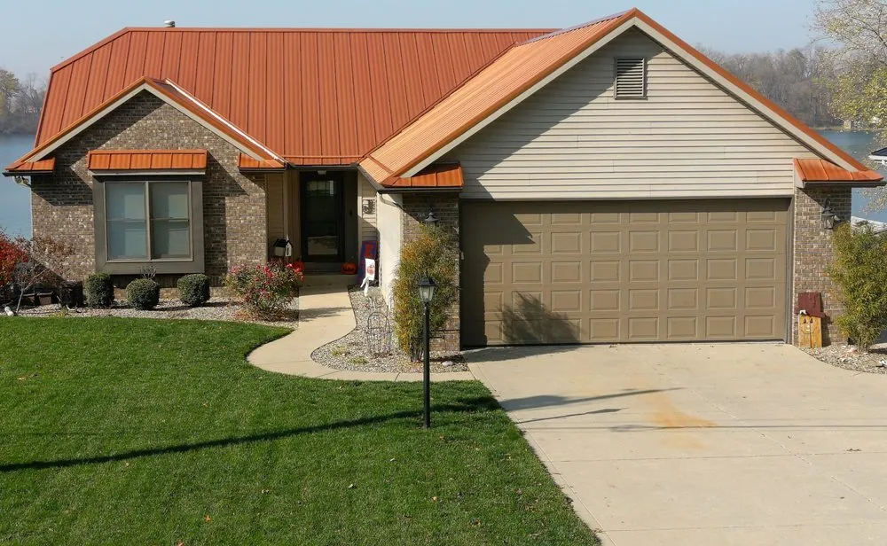 Slide of Steel Master Roofing