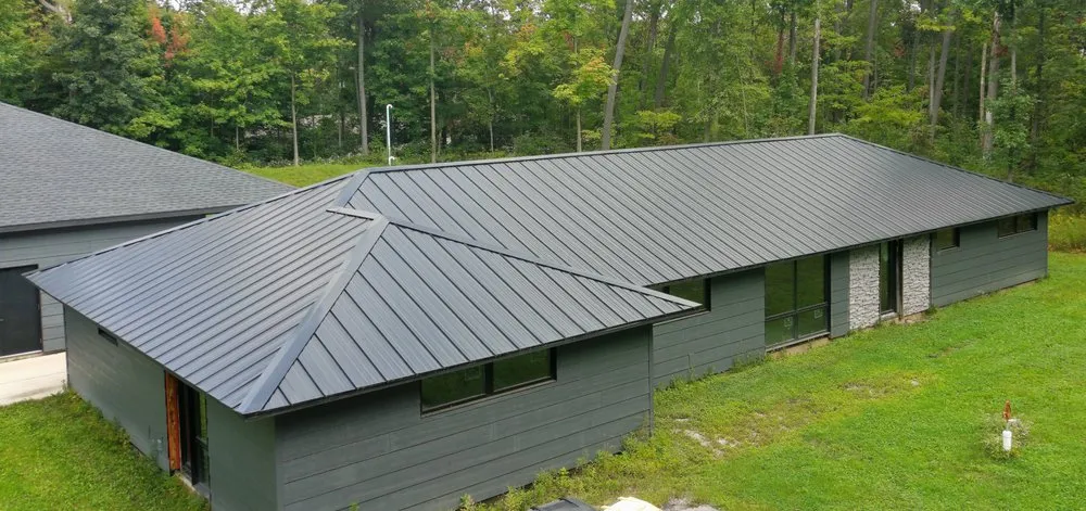 Slide of Steel Master Roofing