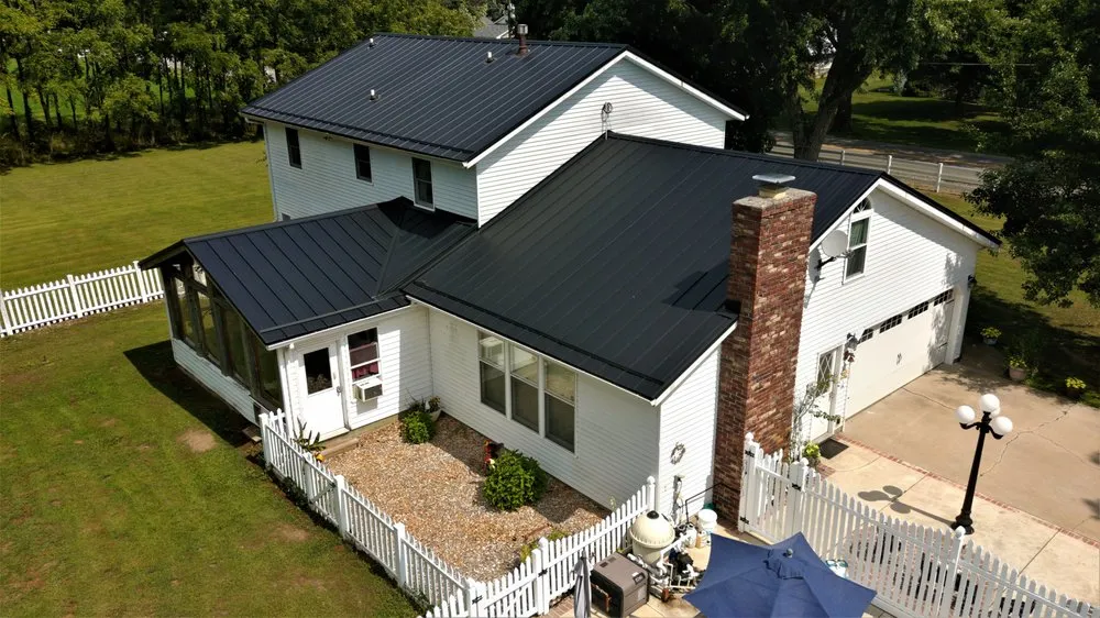 Slide of Steel Master Roofing