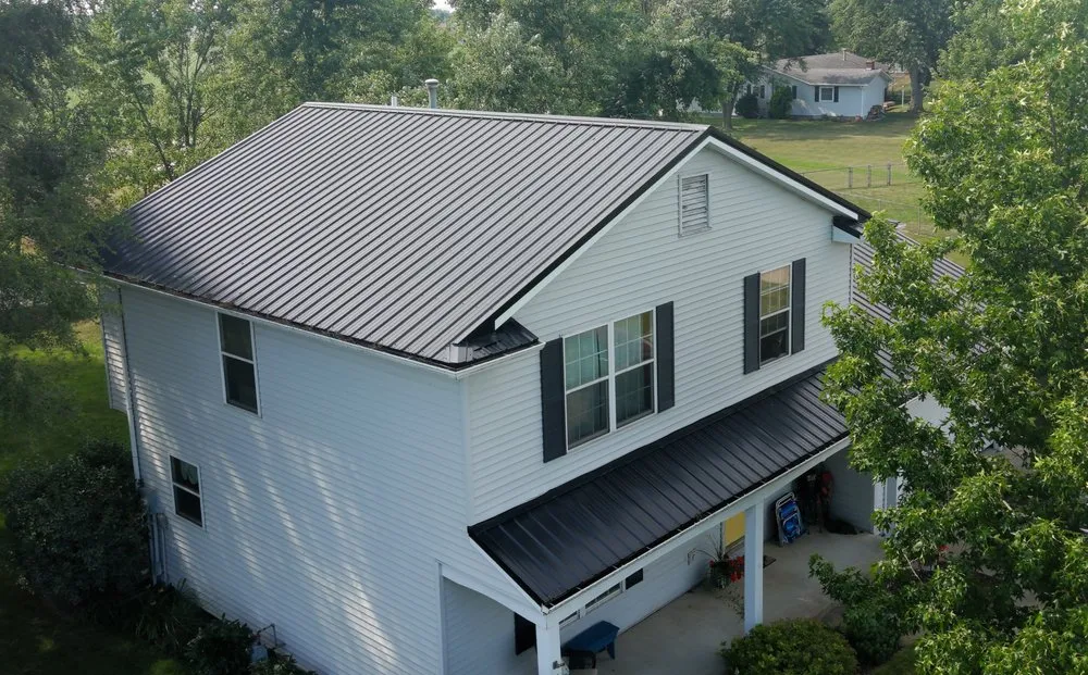 Slide of Steel Master Roofing