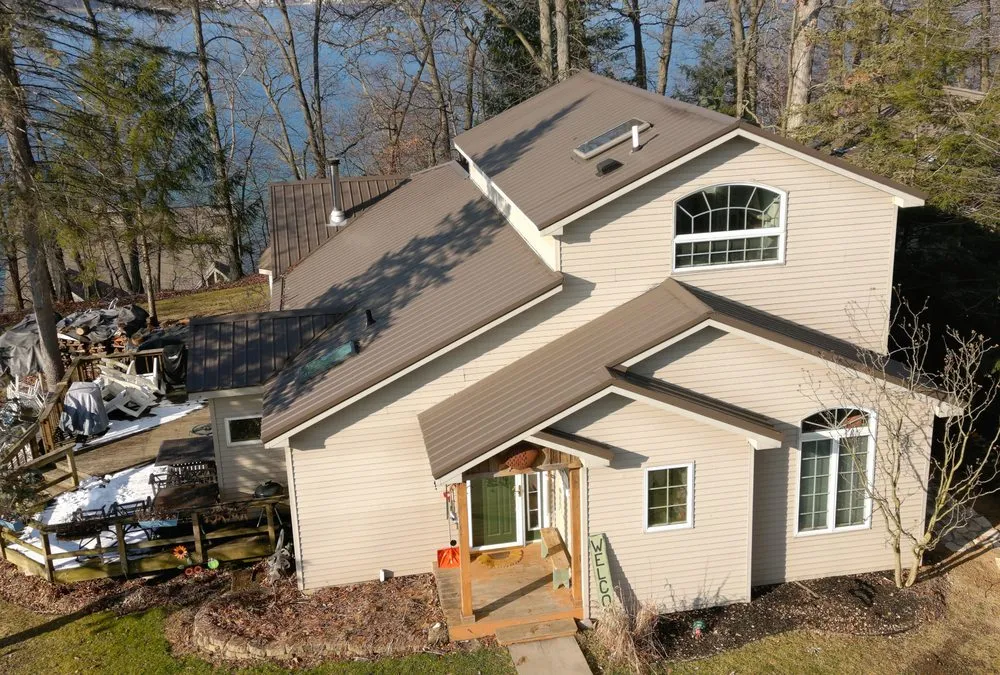 Slide of Steel Master Roofing