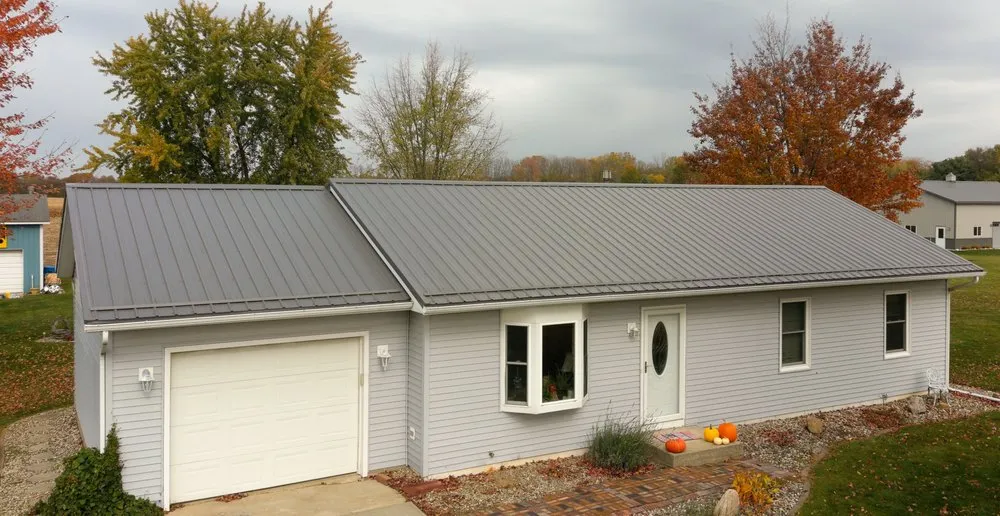 Slide of Steel Master Roofing