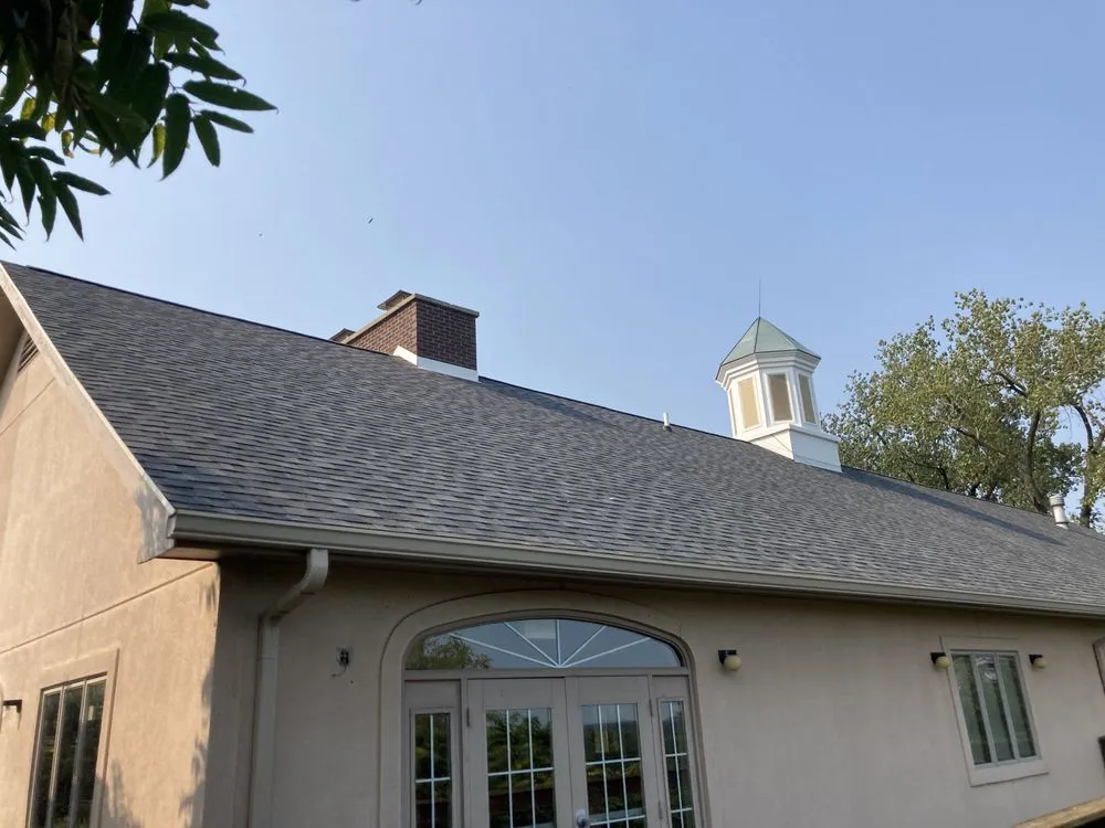 Slide of Steele Roofing