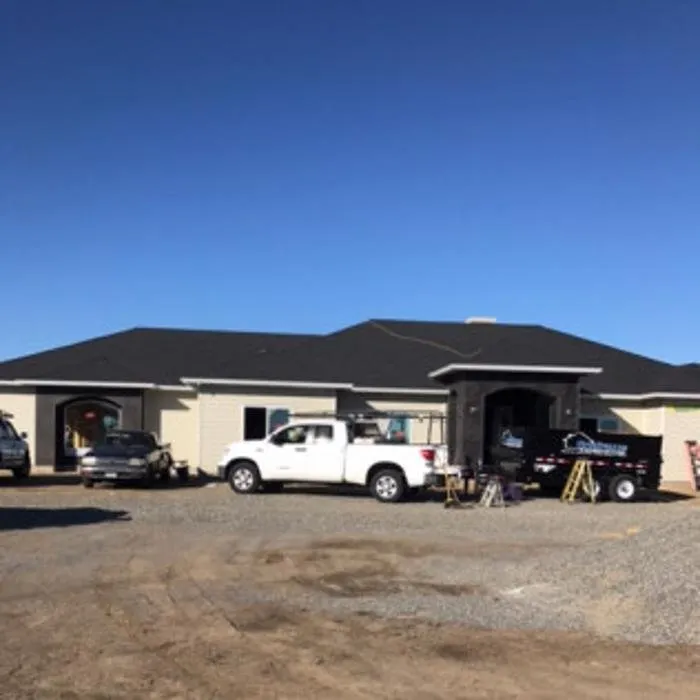 Slide of Steele's Roofing Company