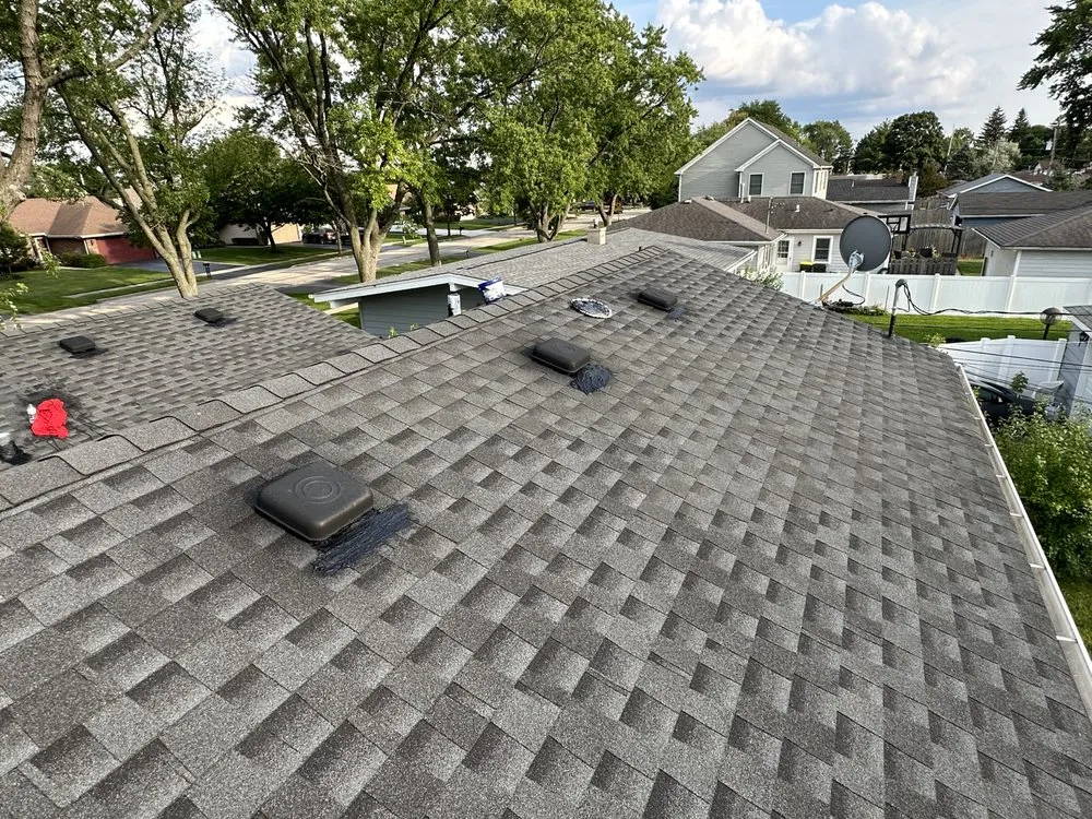 Slide of Stella’s Roofing & Co