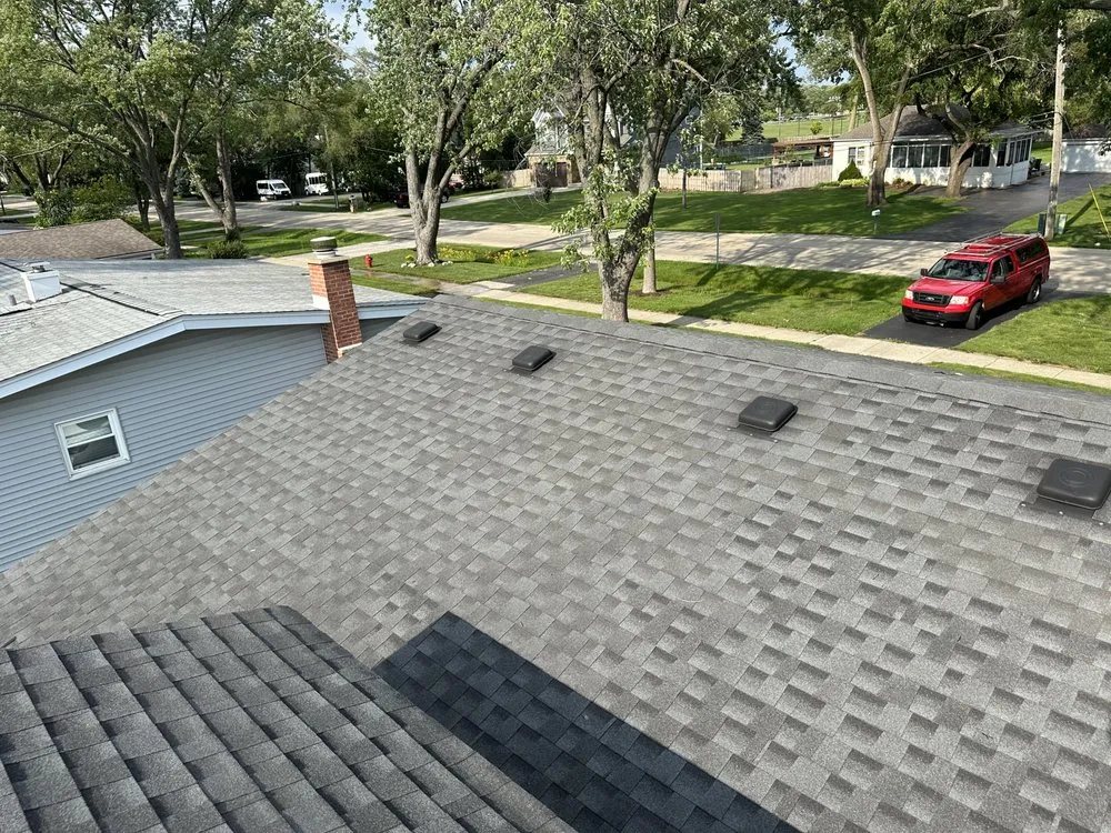 Slide of Stella’s Roofing & Co