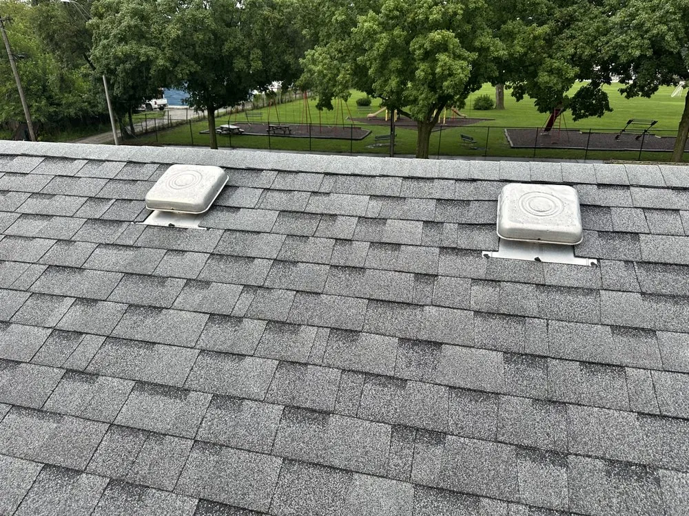 Slide of Stella’s Roofing & Co