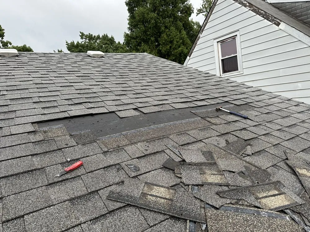 Slide of Stella’s Roofing & Co