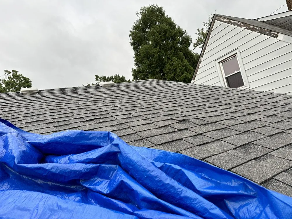 Slide of Stella’s Roofing & Co