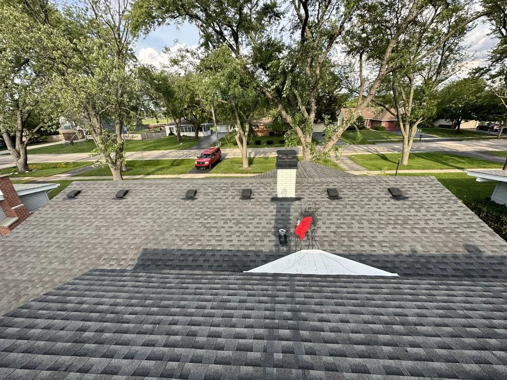 Slide of Stella’s Roofing & Co