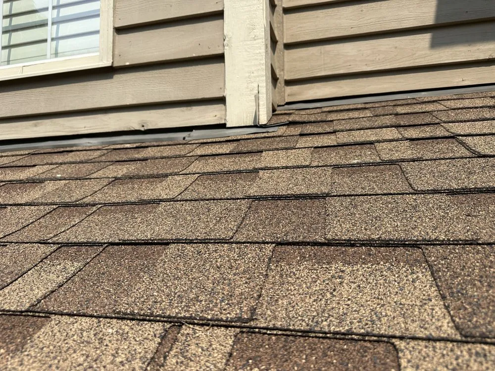 Slide of Stella’s Roofing & Co