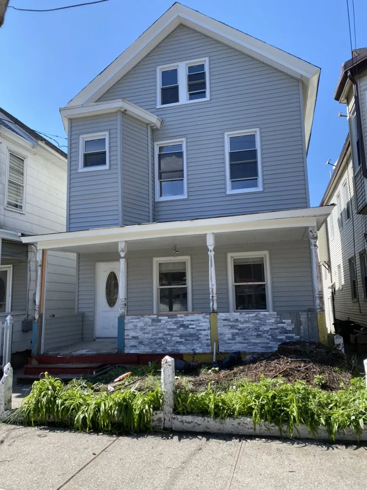 Slide of Steve Siding and Gutters