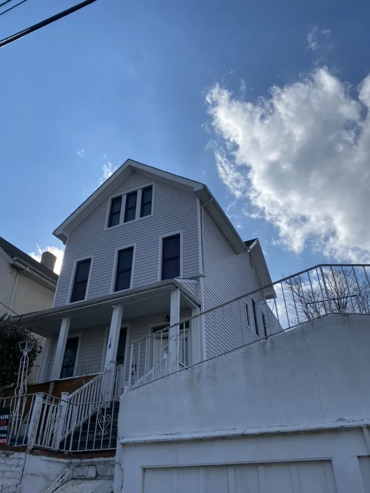 Slide of Steve Siding and Gutters