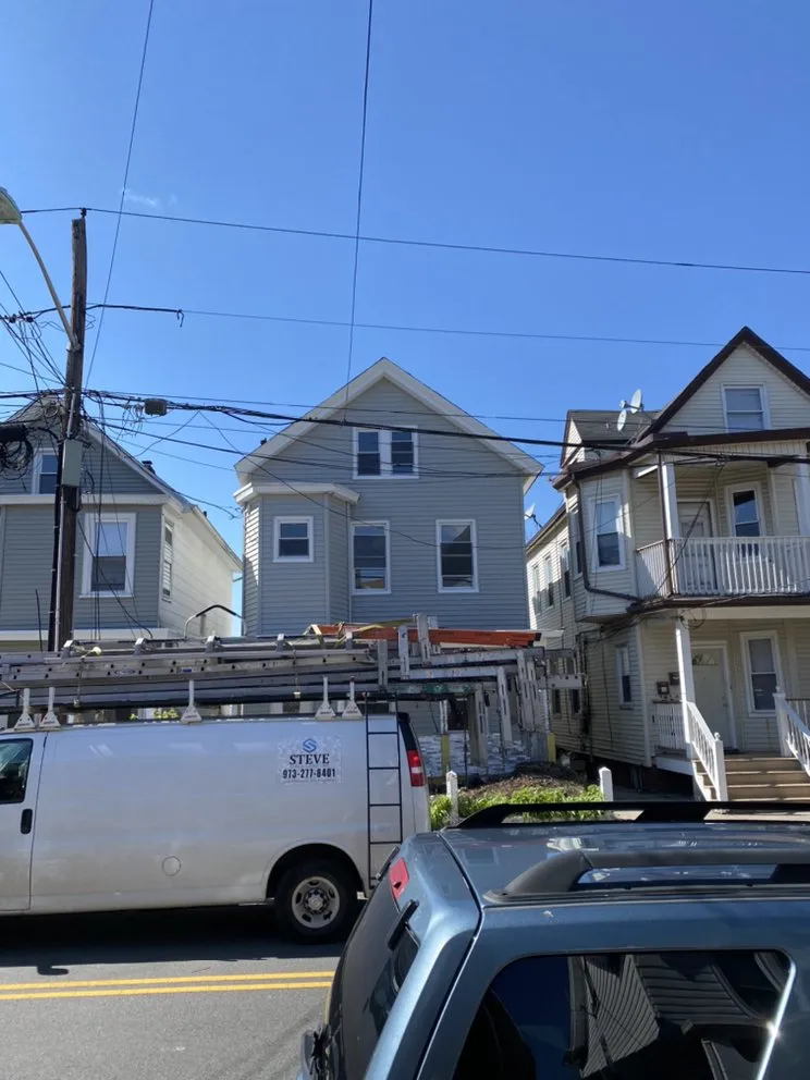 Slide of Steve Siding and Gutters