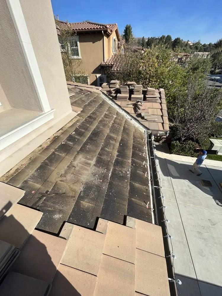 Slide of Steve’s Roofing Repair