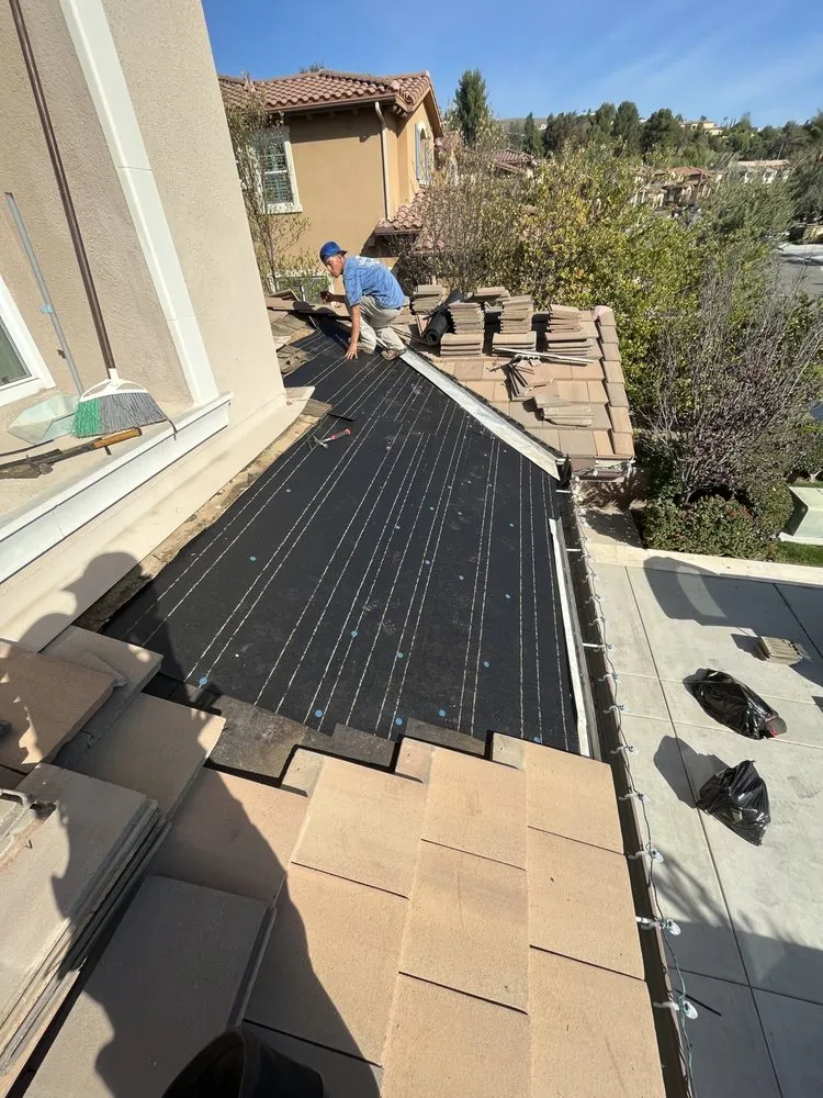 Slide of Steve’s Roofing Repair