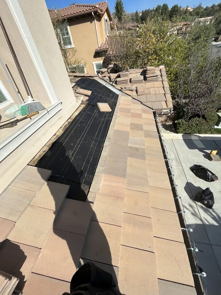 Slide of Steve’s Roofing Repair