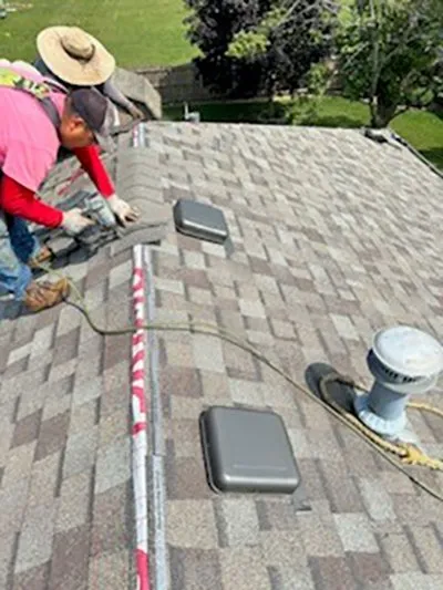 Slide of Stewart Roofing