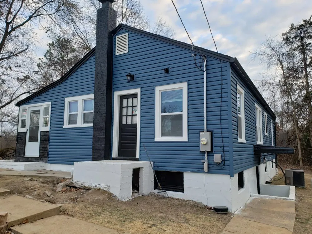 Slide of STL Roofing & Restoration