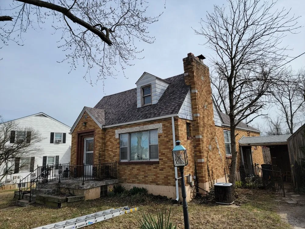 Slide of STL Roofing & Restoration