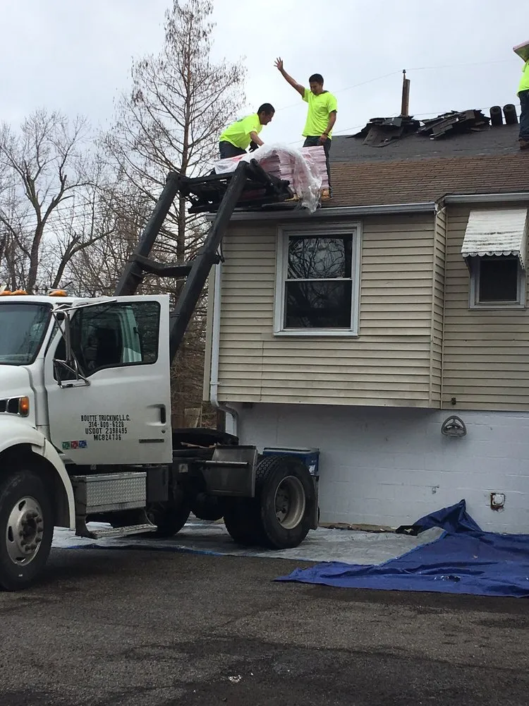 Slide of STL Roofing