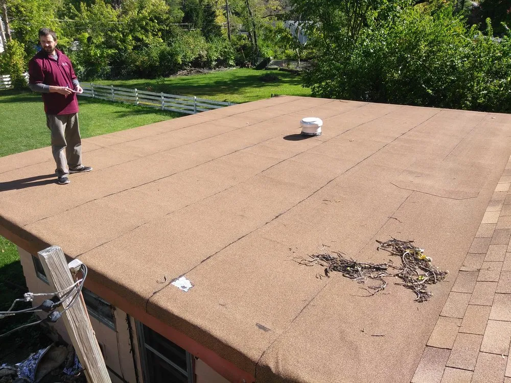 Slide of STL Roofing