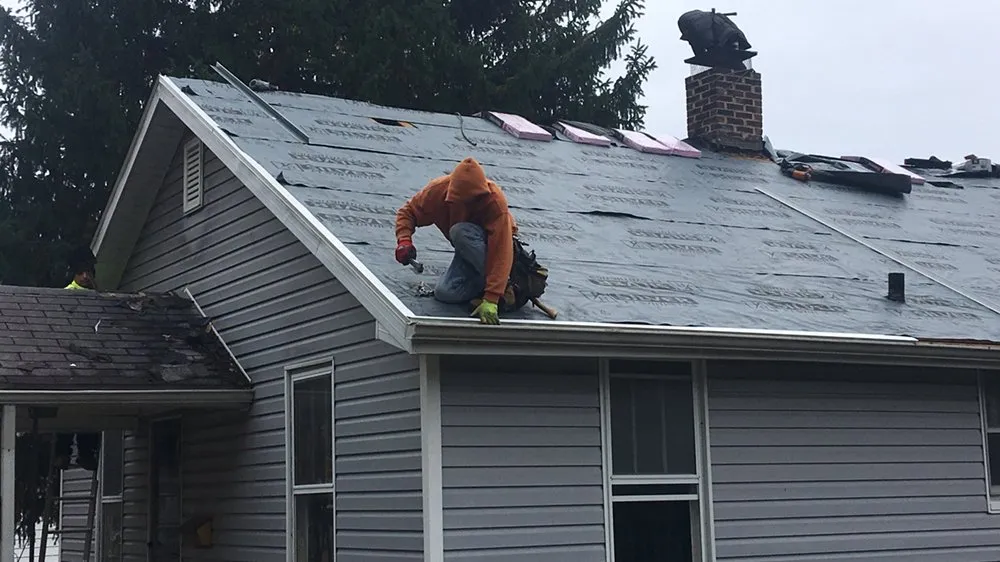 Slide of STL Roofing