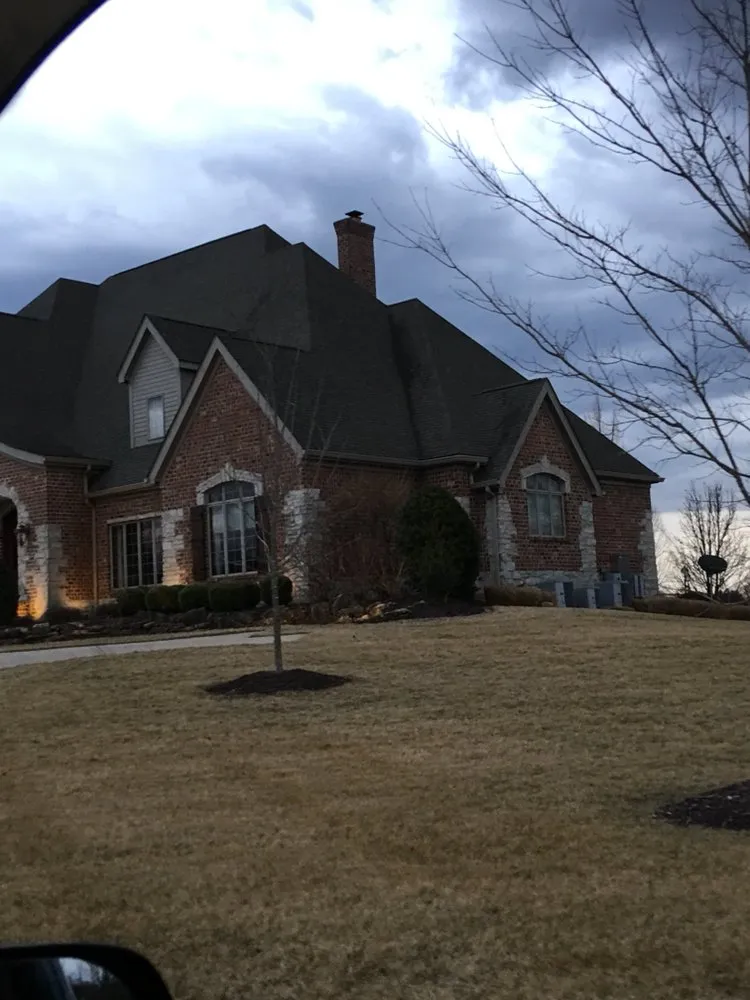 Slide of STL Roofing