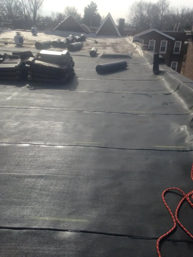 Slide of STL Roofing