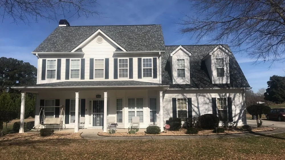 Slide of Stone Mountain Roofing