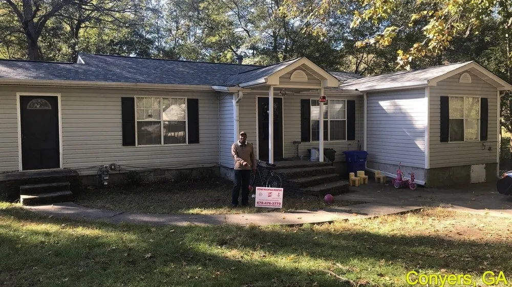 Slide of Stone Mountain Roofing