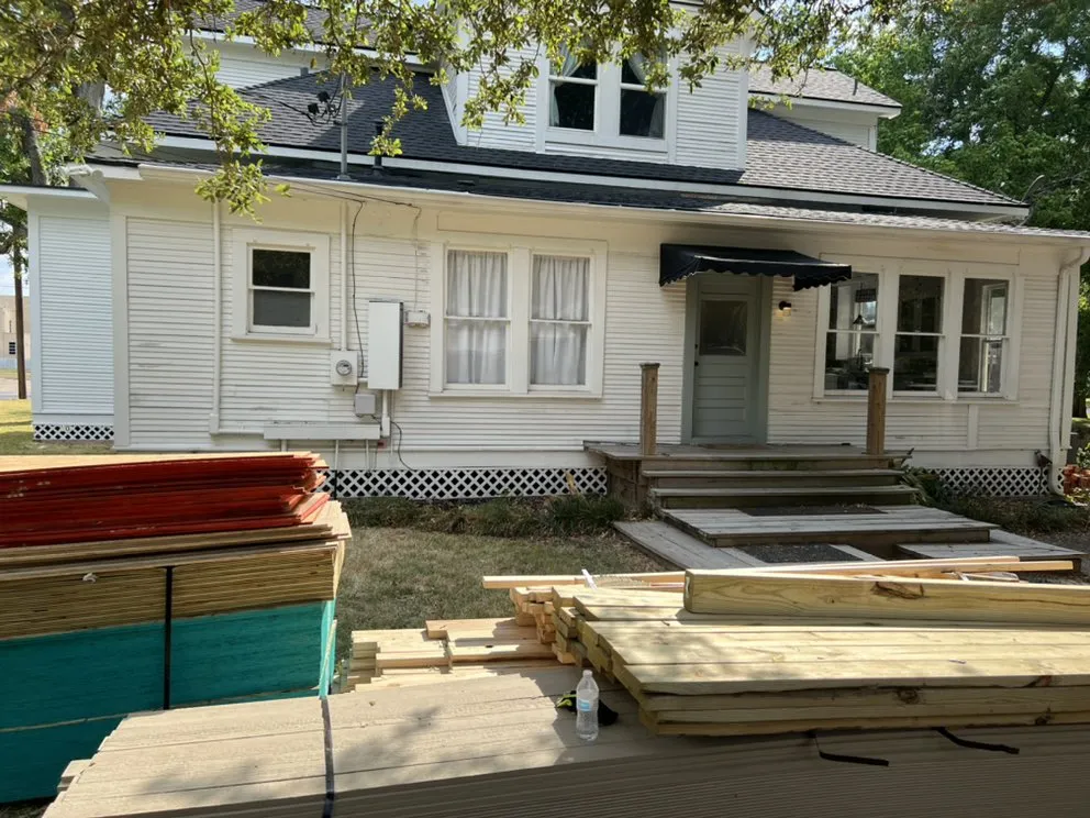 Slide of Stonewall Roofing & Construction