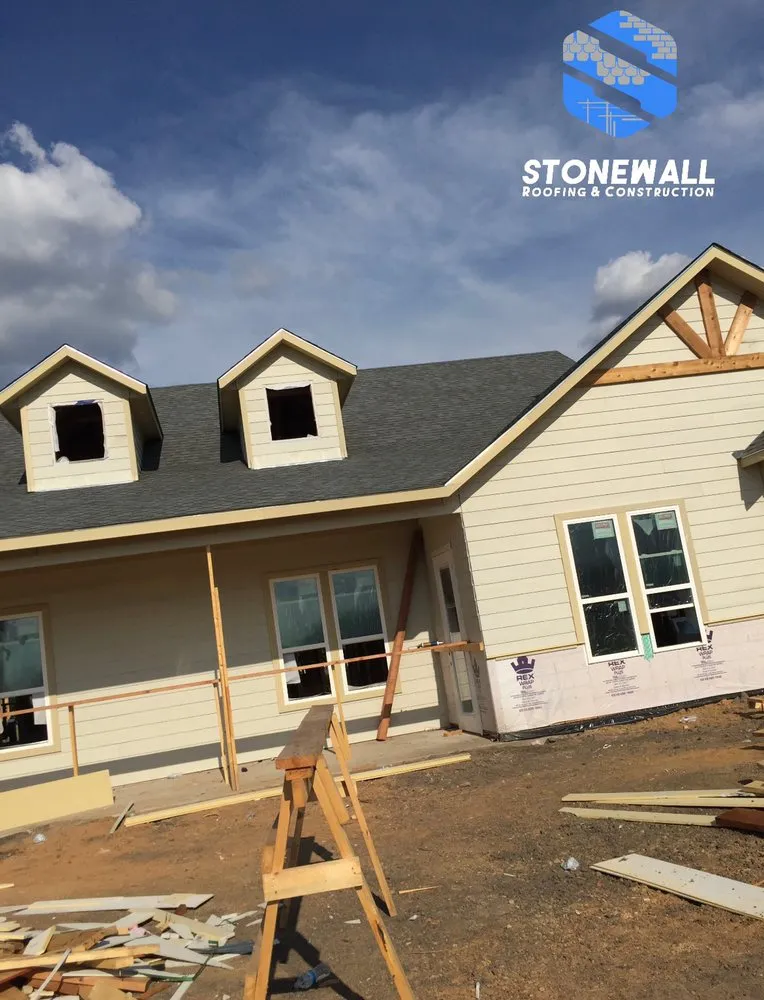 Slide of Stonewall Roofing & Construction