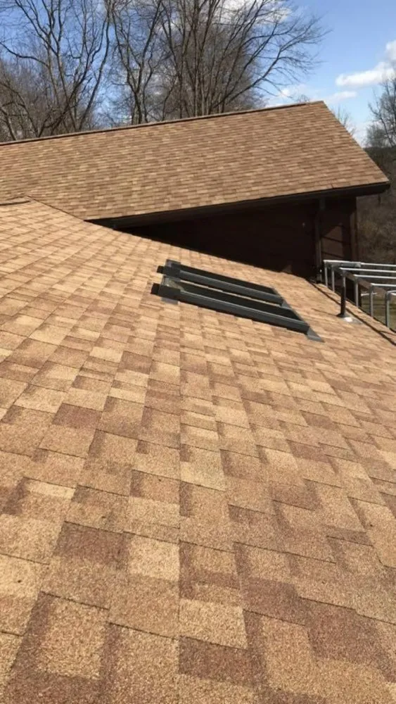 Slide of Stop The Drip Roofing