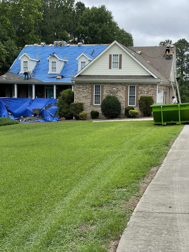 Emergency residential roofing service for residential properties across Iron station, NC - Storm Damage Construction