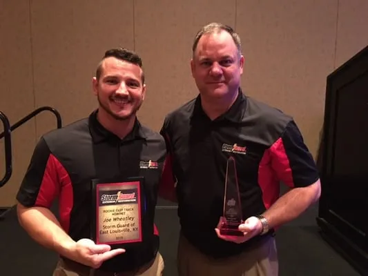 Storm Guard Roofing and Construction Logo