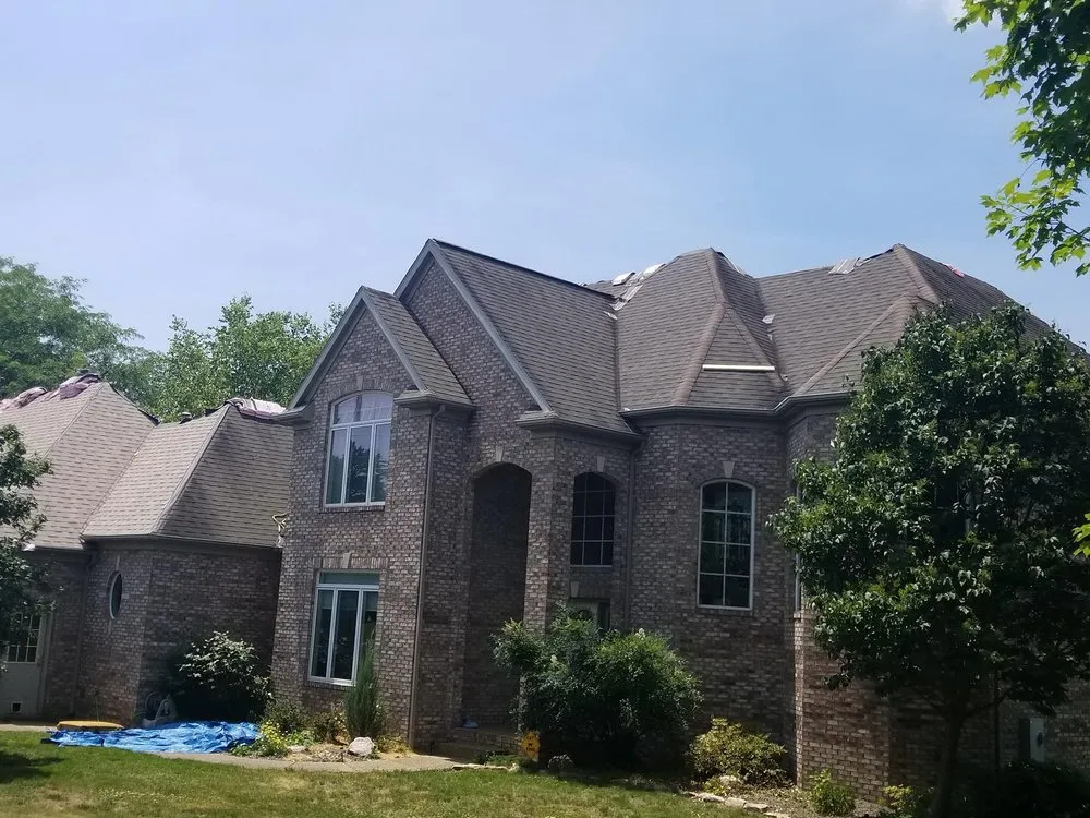 Slide of Storm Kat Roofing