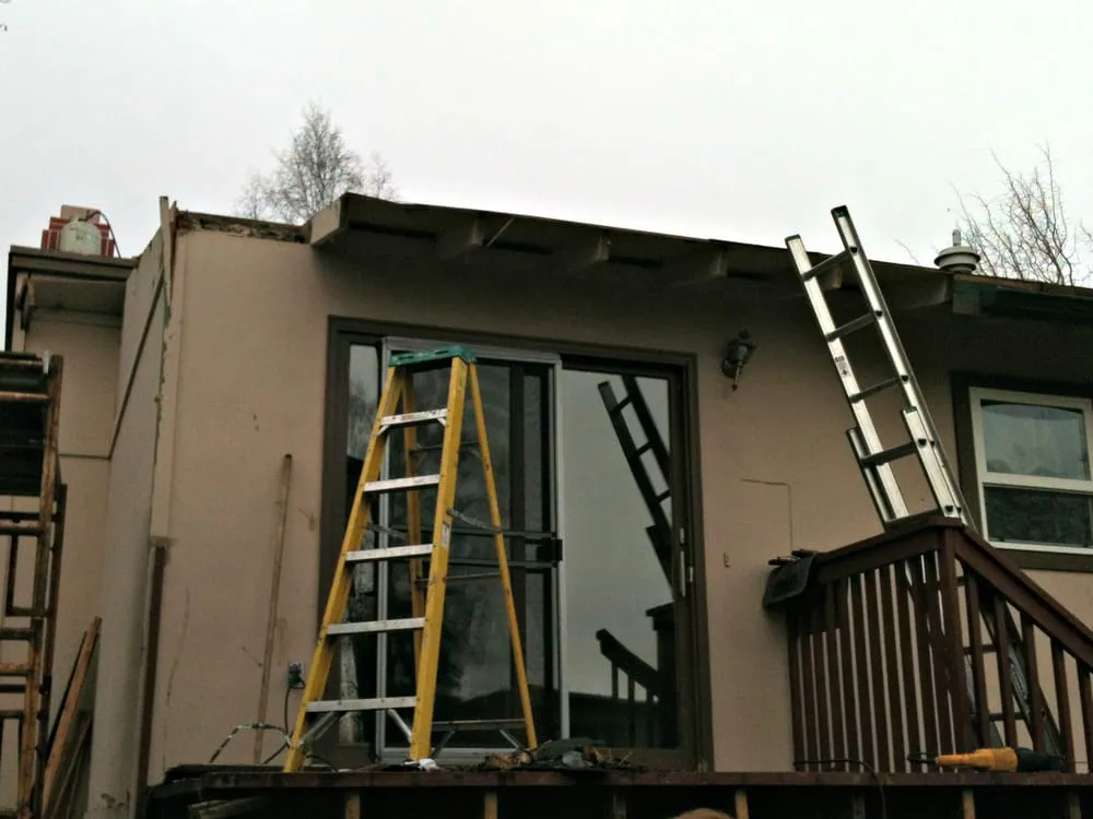 Slide of Storm Proof Roofing