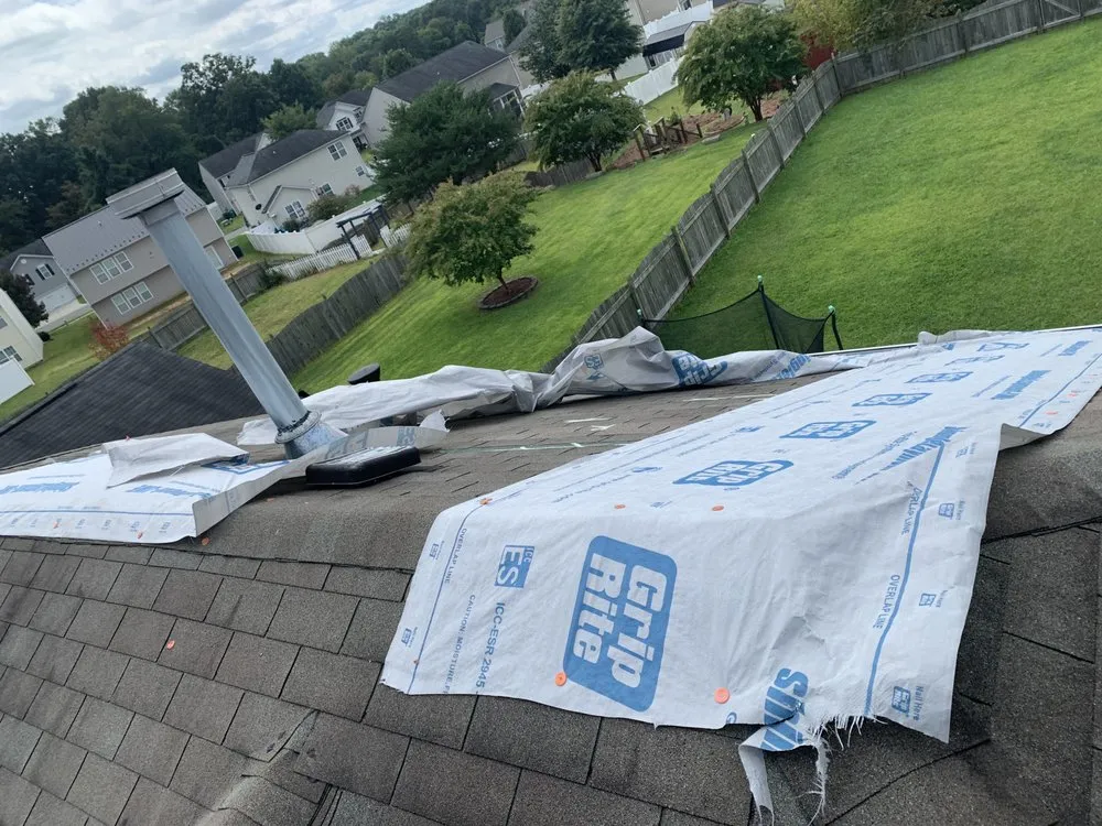 Slide of Storm Surge Roofing & Restoration Services