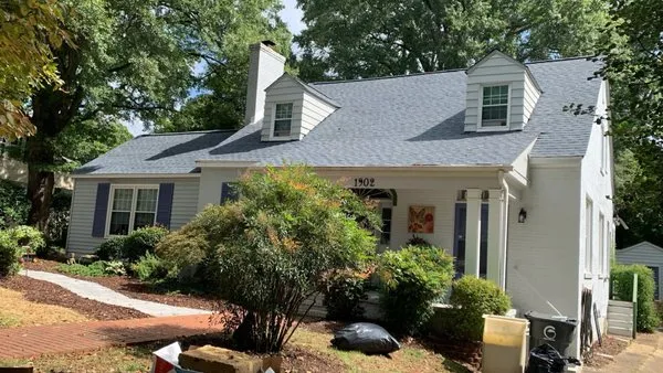 Storm Surge Roofing & Restoration Services Logo