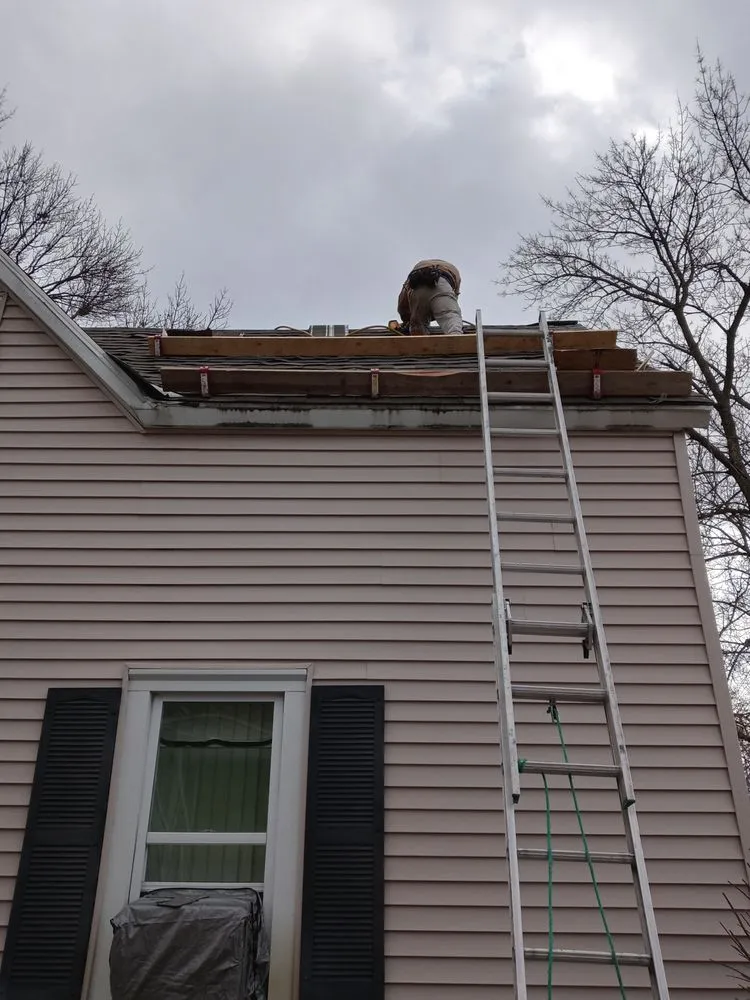 Slide of Straightline Roofing