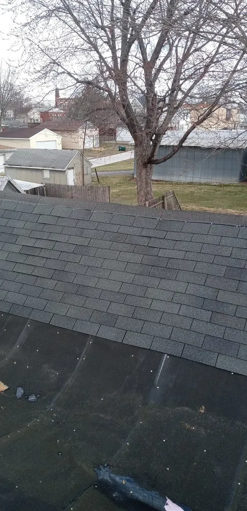 Slide of Straightline Roofing