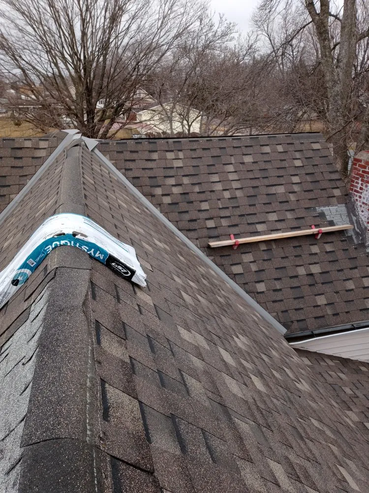 Slide of Straightline Roofing