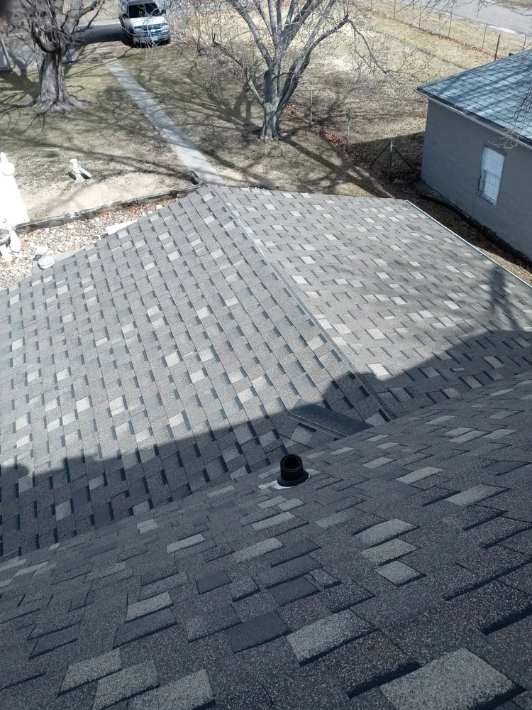 Slide of Straightline Roofing
