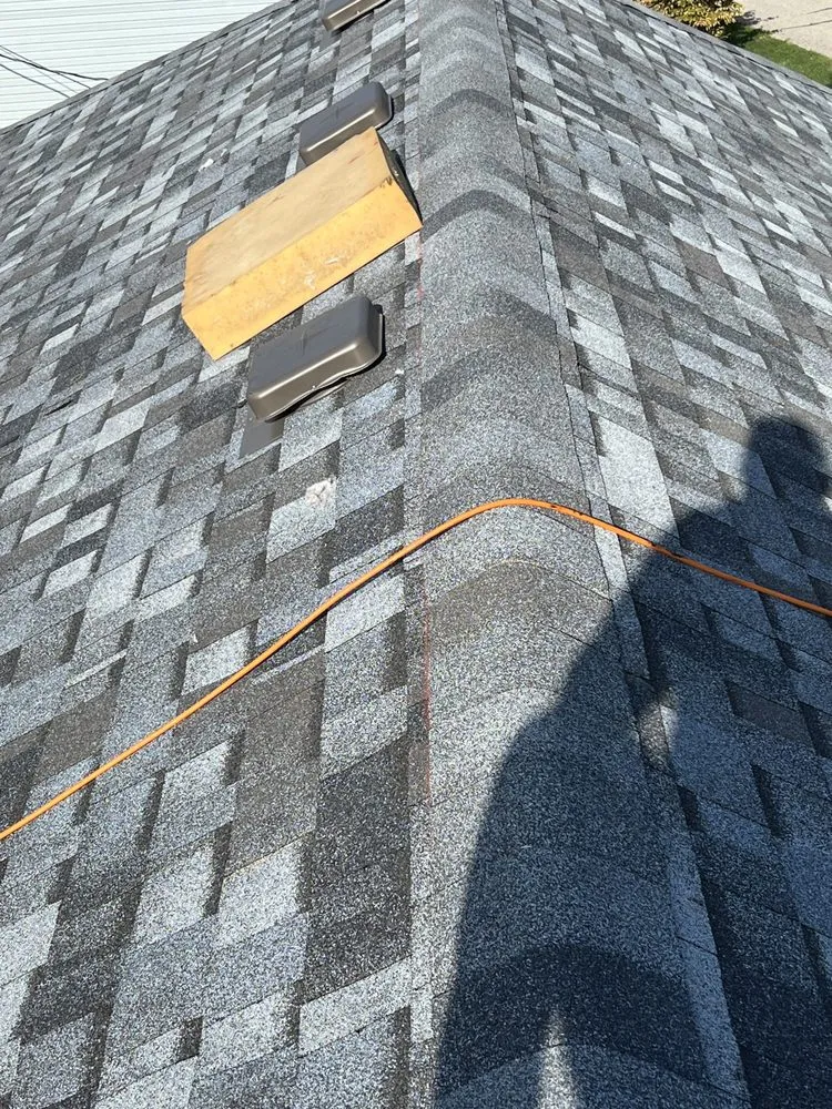 Slide of Strain Roofing