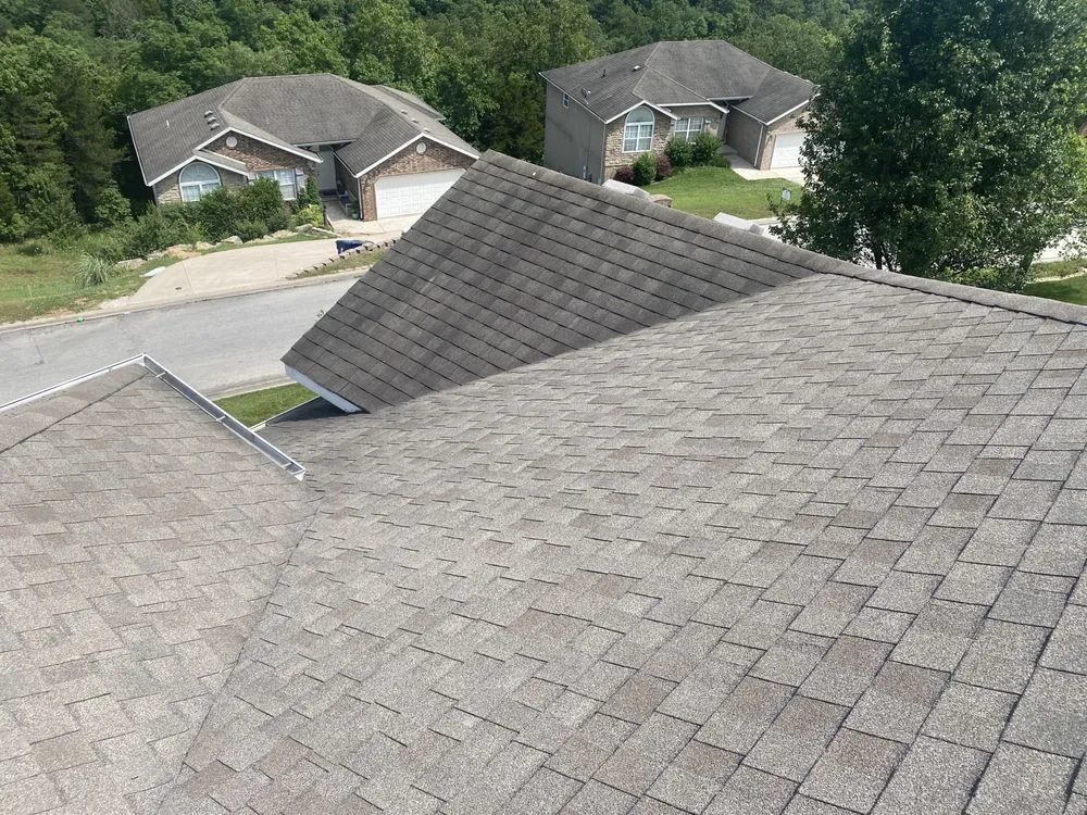 Slide of Strain Roofing