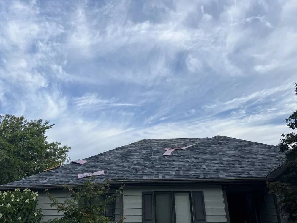 Slide of Strain Roofing