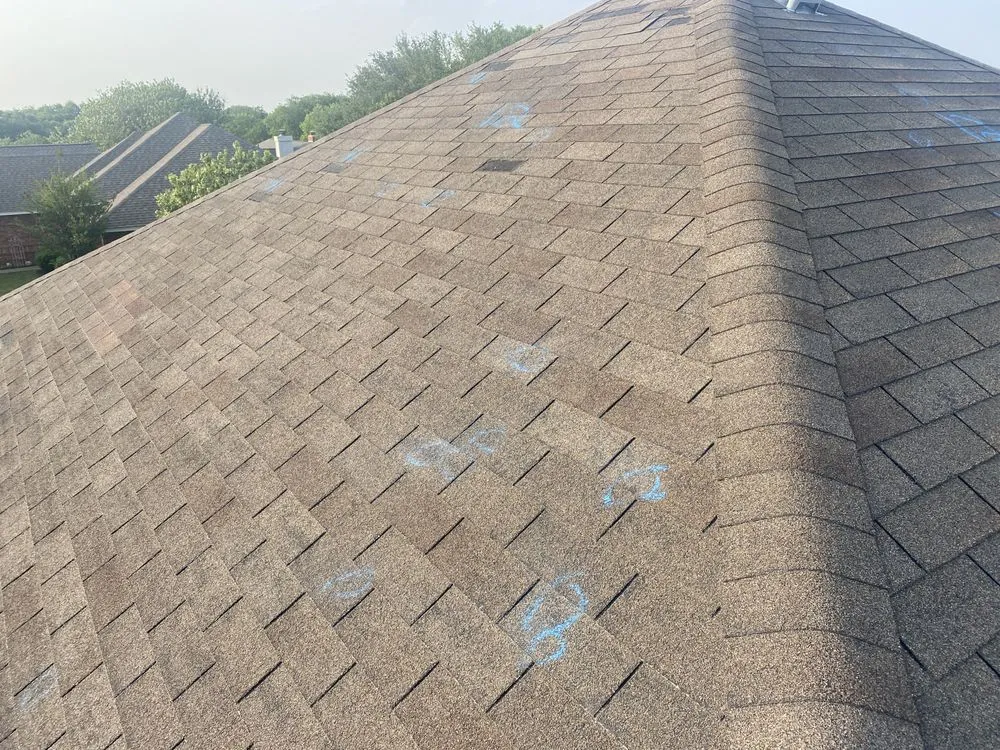 Slide of Strain Roofing