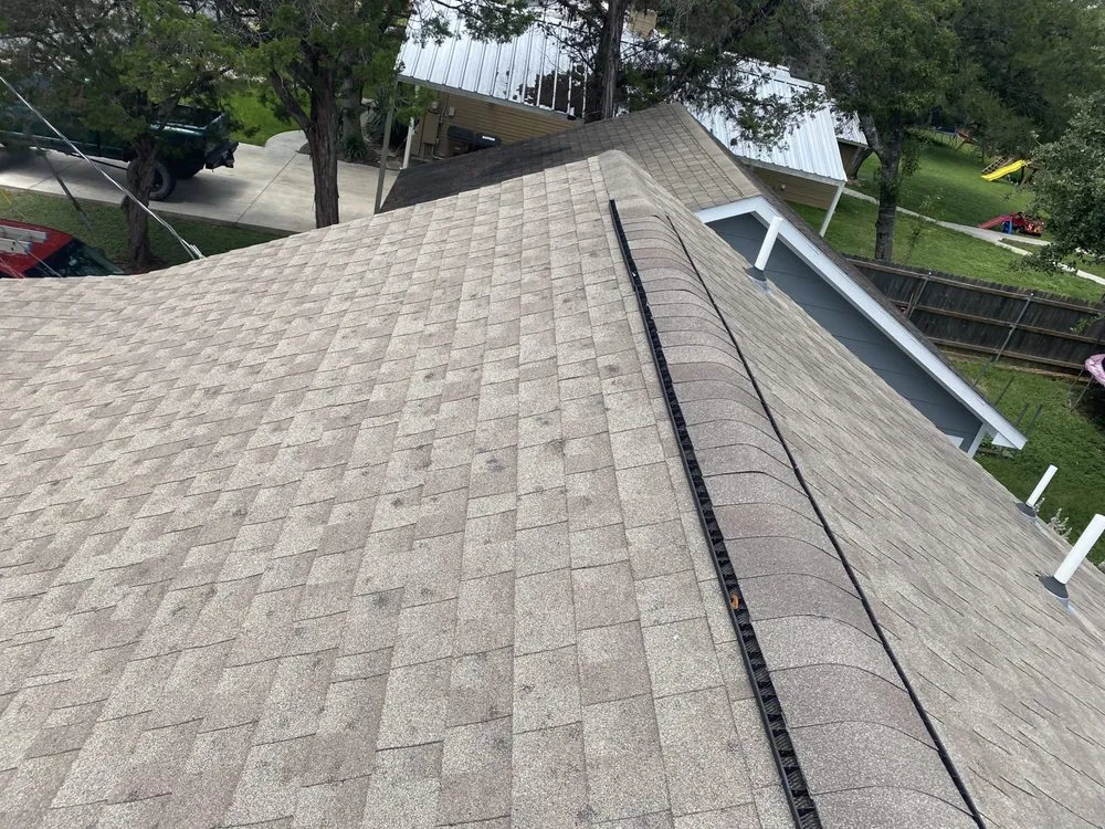 Slide of Strain Roofing