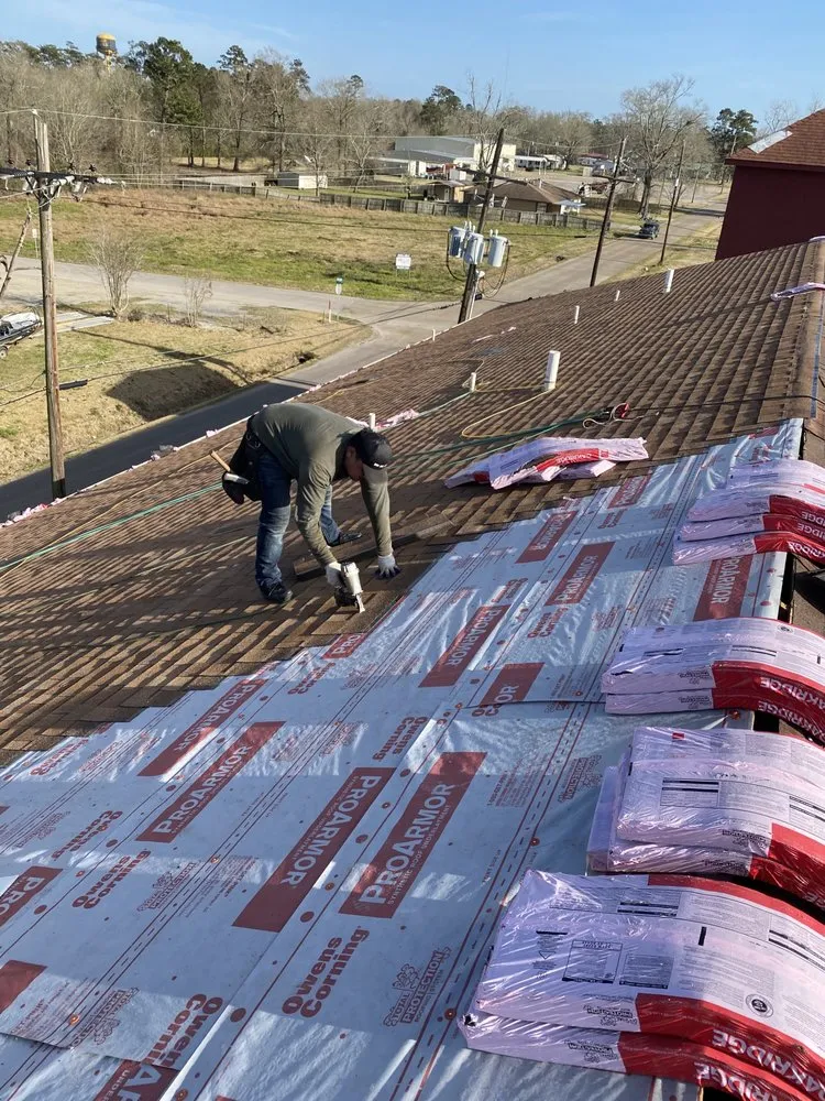 Slide of Strain Roofing